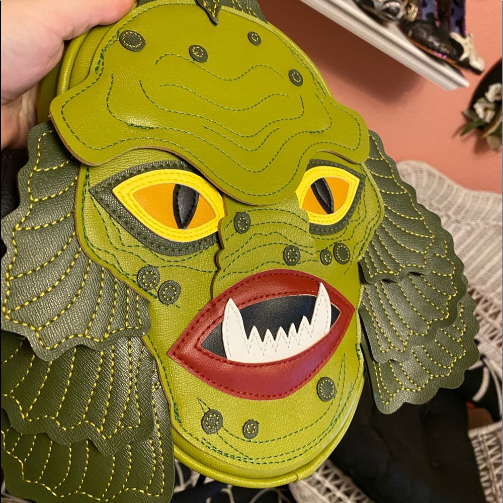 Love pain and stitches creature crossbody bag